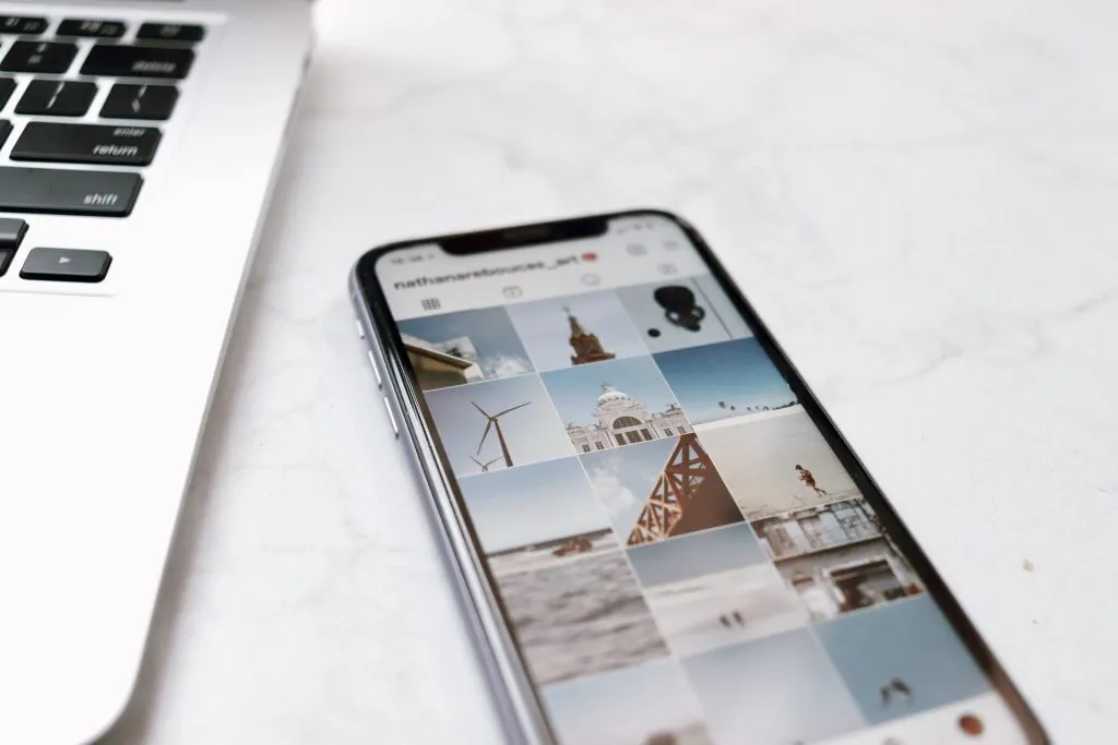 A photographer composing a well-lit, high-quality shot for an Instagram feed